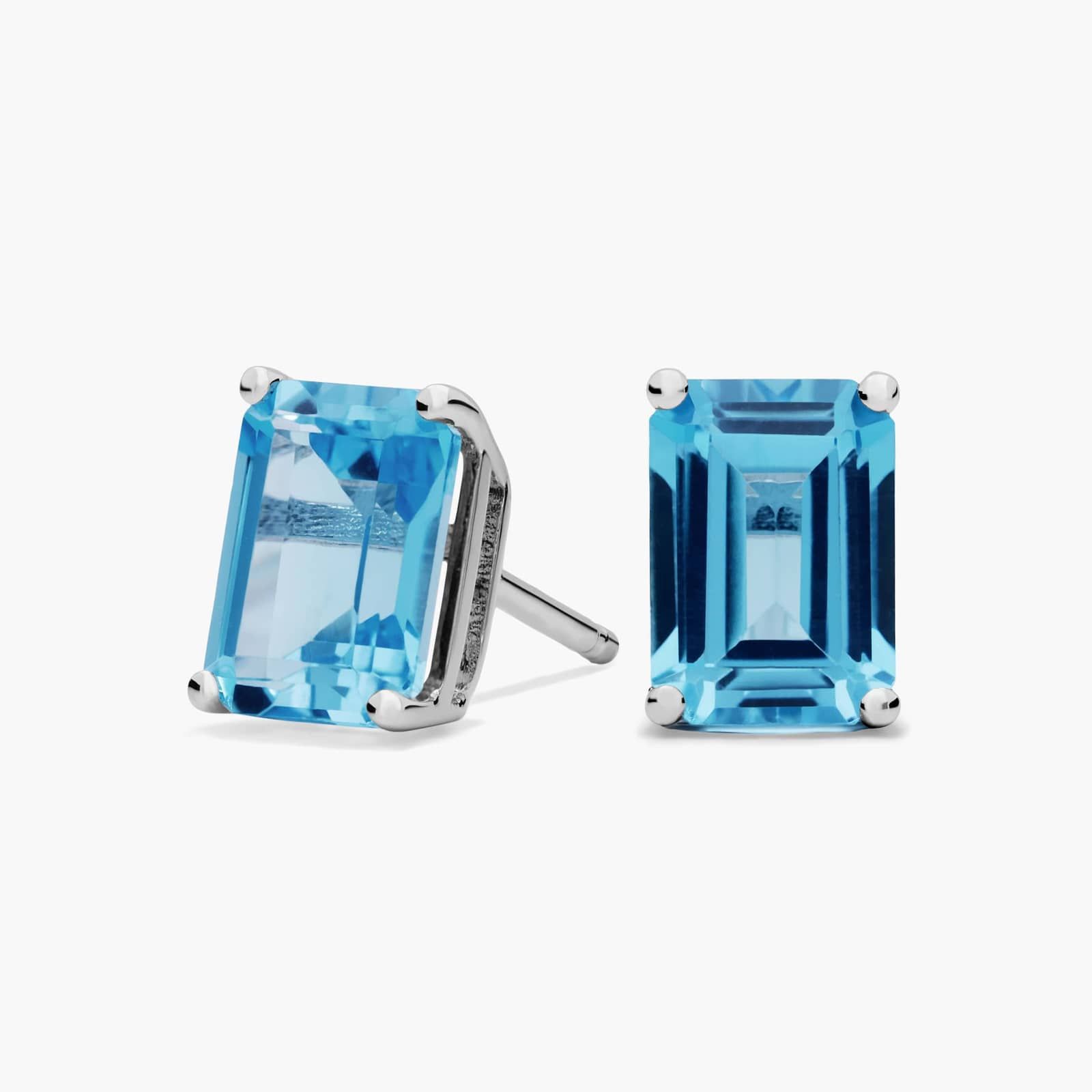 Emerald Cut Birthstone Blue Topaz Stud Earrings In 14k White Gold (7X5mm)