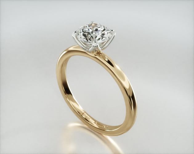 Solitaire Engagement Ring Embellished With a Four Prong Tulip Basket