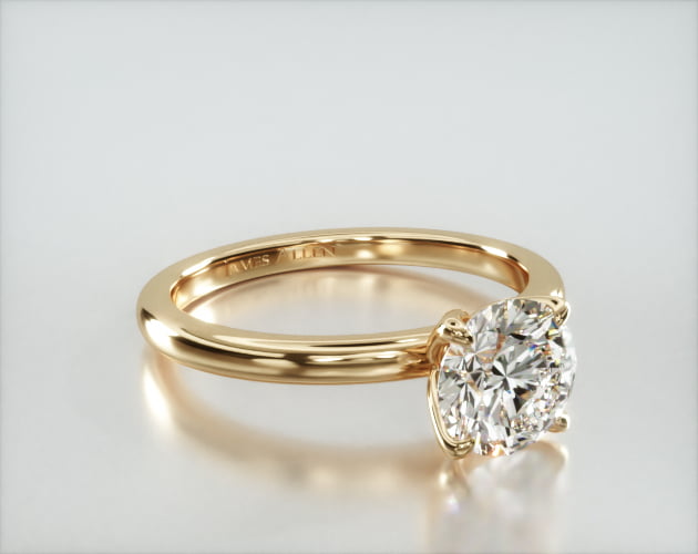 Solitaire Engagement Ring Embellished With a Four Prong Tulip Basket