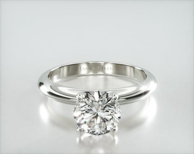 Knife Edge Solitaire Engagement Ring Embellished With a Four Prong