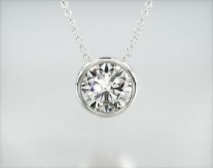 This hand crafted, bold design accents the beauty of the single round brilliant diamond of your choice by using a thin bezel and circle accented basket. This pendant comes on an 18 inch chain with a lobster clasp. Center diamond or gemstone purchase required