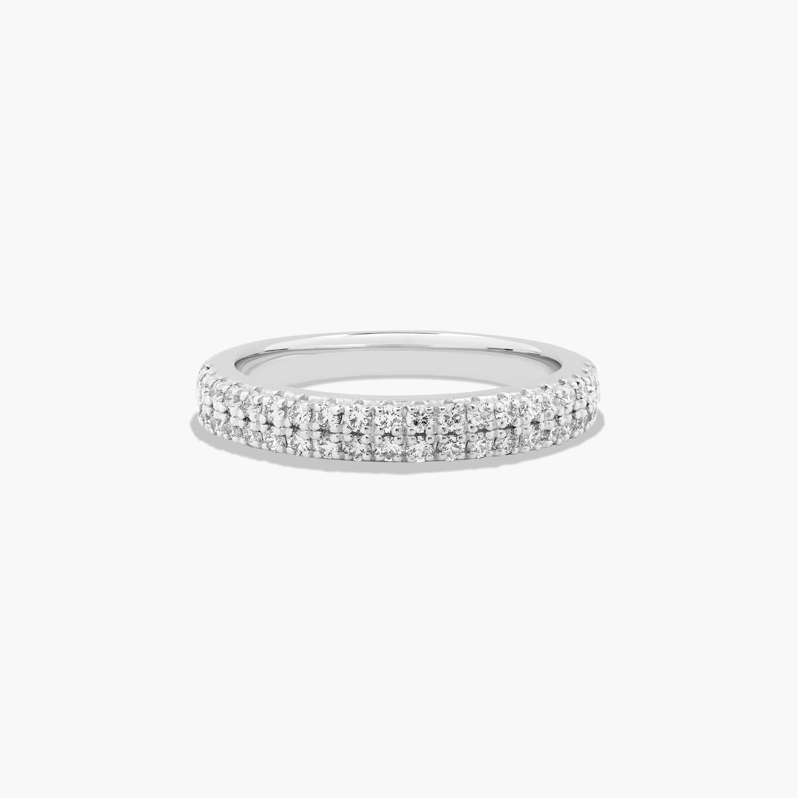 A online Shimmering Row Of Pave-Set Diamonds Adorns Both Side Of The Precious Men's Band, Striking Features Hidden Diamond Band In 14k White gold