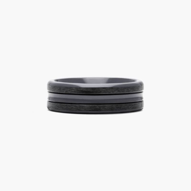 James Allen's black titanium ring collection is sophisticated and undeniably eye-catching. Crafted from aircraft grade titanium, the black titanium ring is permeated with color creating a lasting finish.Couple these outstanding qualities with a rounded polished interior that allows the ring to slide easily and rest comfortably on the finger and you are sure to embrace the lighter side of strength.