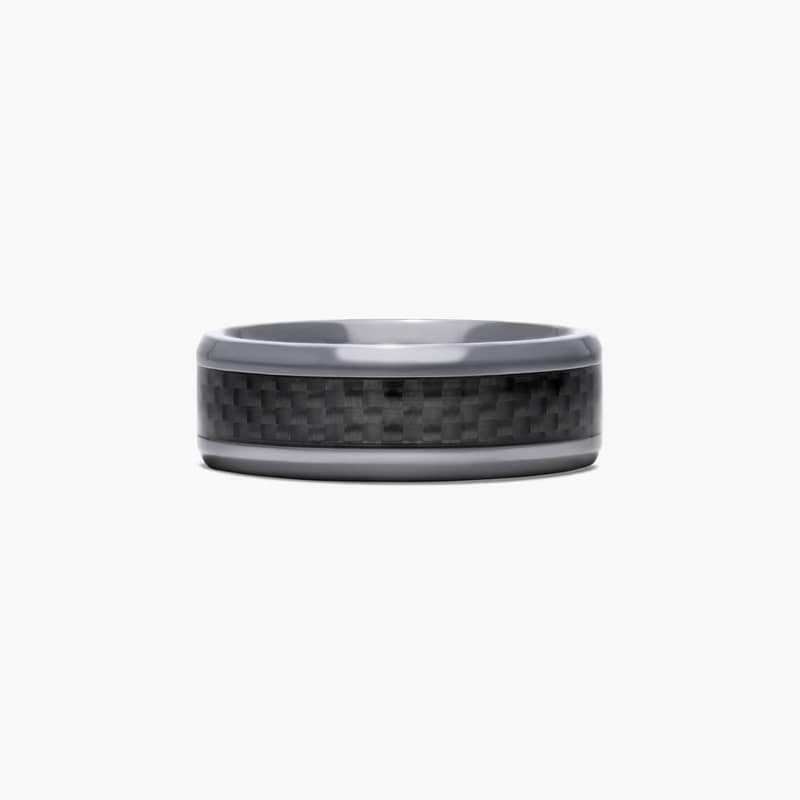 James Allen's black titanium ring collection is sophisticated and undeniably eye-catching. Crafted from aircraft grade titanium, the black titanium ring is permeated with color creating a lasting finish.Couple these outstanding qualities with a rounded polished interior that allows the ring to slide easily and rest comfortably on the finger and you are sure to embrace the lighter side of strength.