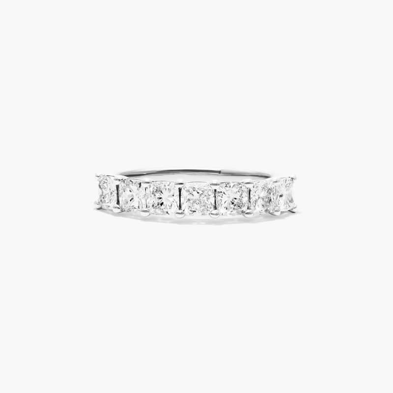 This timeless seven stone anniversary ring features the boldness and intense sparkle of cushion shape lab created diamonds.  A classic, tailored shared prongs setting allows the maximum amount of the lab created diamonds surface to show.