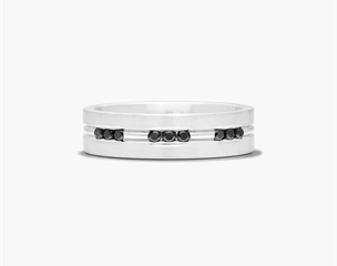 This beautiful 6mm comfort-fit etched channel set diamond band features a satin-finished and a polished horizontal center trim between rows of three round cut black diamonds. Comfort Fit: A comfort fit design features a rounded polished interior that allows the ring to slide easily and rest comfortably on the finger.