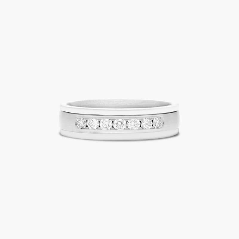 This beautiful satin finish 6mm mens diamond band features a strong round edge that surrounds multiple beautiful round cut stones. Total Carat weight of this band is approximately .42CTW.