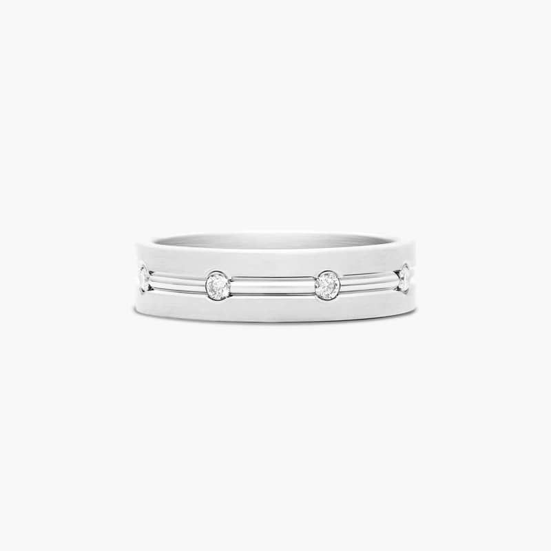 This beautiful platinum 6mm diamond eternity band features a high polished center trim between multiple round cut stones. Total diamond carat weight is approximately .32CTW.