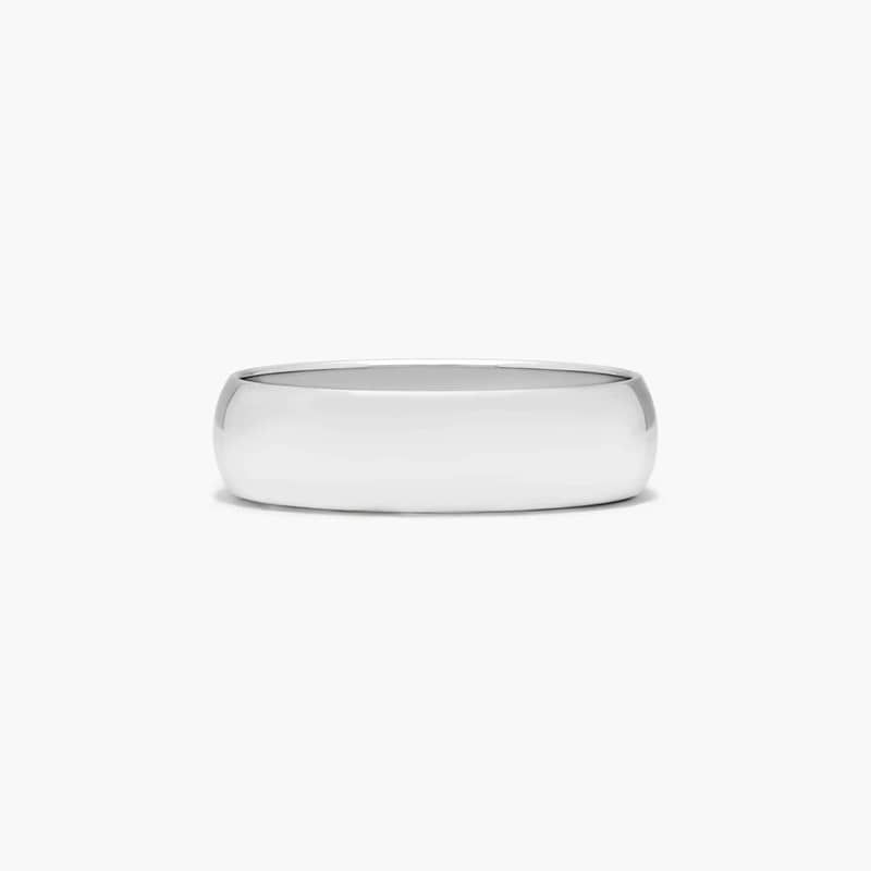 This 6mm traditional band has a classic inside and a lower dome surface on the outside that provides both a modern and classic profile.