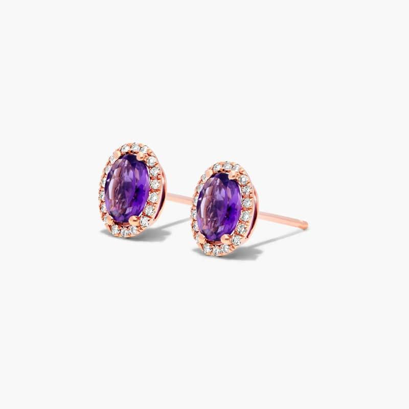 Oval Cut Amethyst And Diamond Halo Stud Earrings In 14K Rose Gold