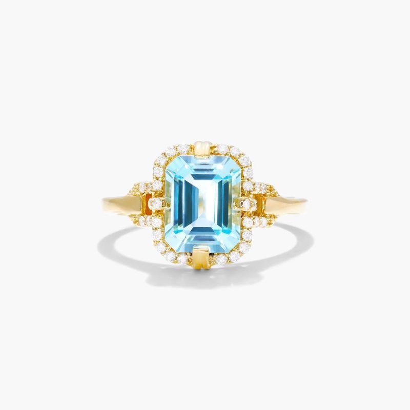 18K Yellow Gold Sky Blue Topaz Diamond Halo Ring