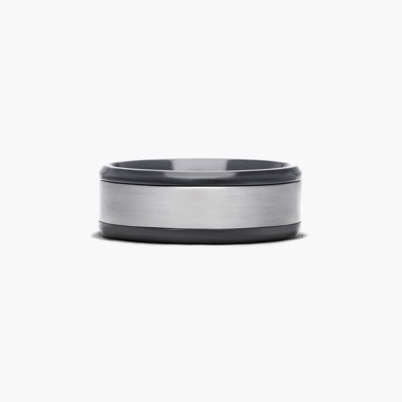 This satin finish two tone 8mm ring features a tantalum center with black titanium edges.