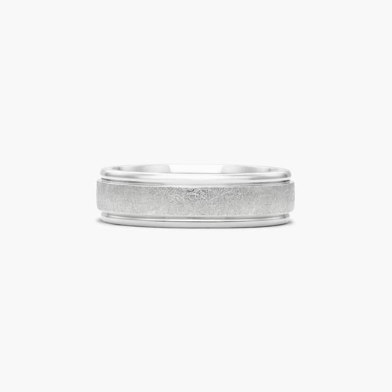 Cobalt is four times harder than gold, hypoallergenic, and scratch resistant creating the perfect combination! This ring also features a swirl finished center and rounded polished edges.
