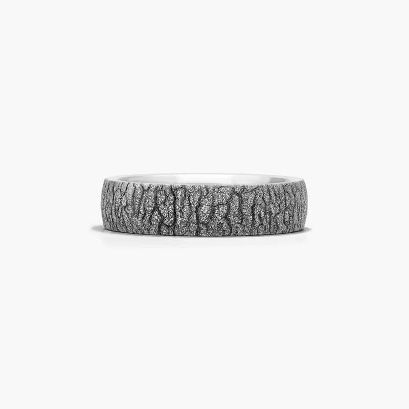 Cobalt is four times harder than gold, hypoallergenic, and scratch resistant creating the perfect combination! This 6mm band features a striking bark pattern for those looking for edgy design.