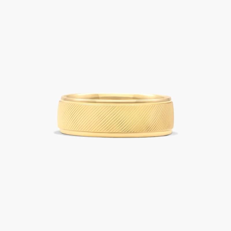 If you are looking for something unique look no further. This design features very fine diagonal grooves that reflect light so it gives the optical illusion of movement. A mesmerizing ring that will capture you every time.
