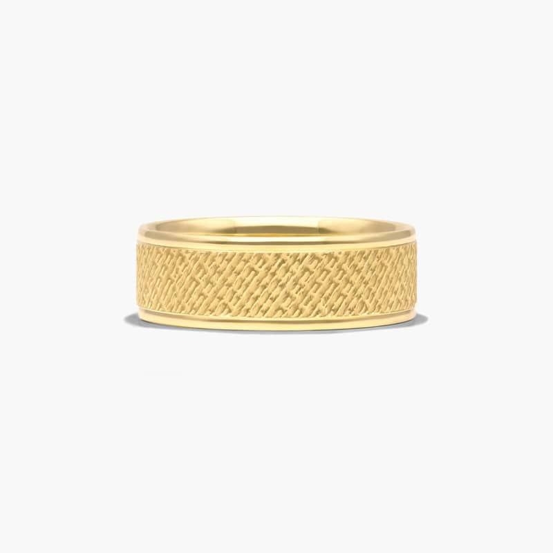 If you are looking for something unique look no further. This design features a very fine cross hatch pattern grooves that reflect light so it gives the optical illusion of movement. A mesmerizing ring that will capture you every time.