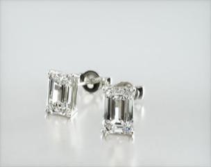 This pair of classic, emerald shape diamond earrings feature a tapered basket that showcases the unique characteristics of the emerald shape diamonds of your choice. The bold flashes of light and a luminescent nature capture the eye with every move. Center diamonds or gemstones purchase required
