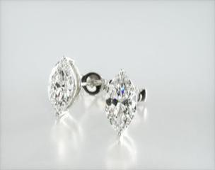This pair of classic marquise cut diamond earrings feature a tapered basket, showcasing the unique characteristics and striking outline of the marquise cut diamond of your choice. Splinters of light shimmer and shine with every move. Center diamonds or gemstones purchase required