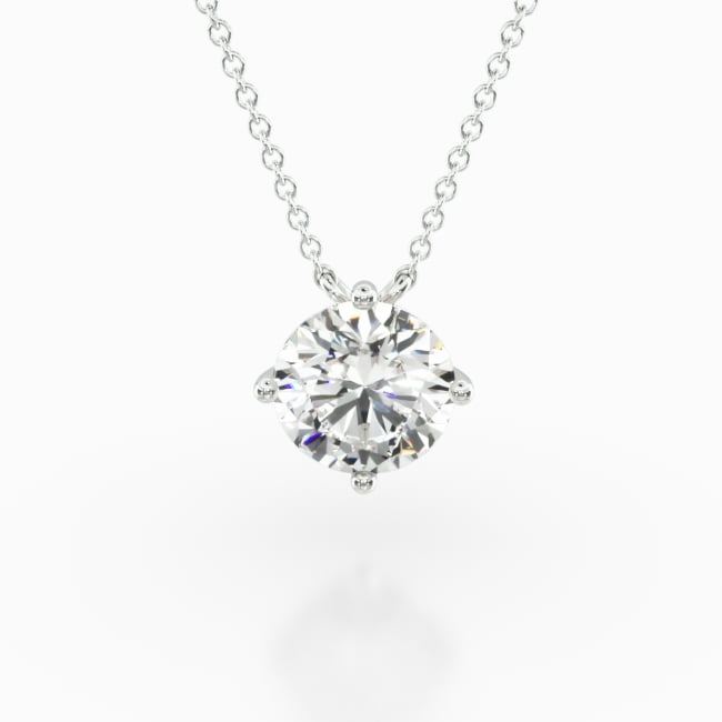 This pendant is designed to showcase the beauty of a round brilliant cut diamond of your choice. The finely crafted four prong wire basket pendant features a kite orientation to add a twist to the traditional solitaire necklace. Center diamond or gemstone purchase required
