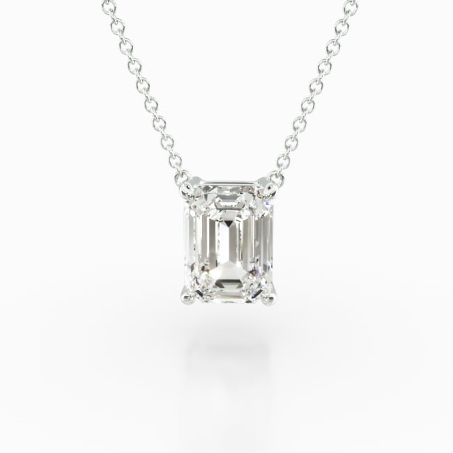 This light four prong wire basket is designed to showcase the unique characteristics of the emerald cut diamond of your choice. This lovely solitaire pendant is attached to an 18" cable link chain. Truly a classic design that is perfect for any occasion. Center diamond or gemstone purchase required