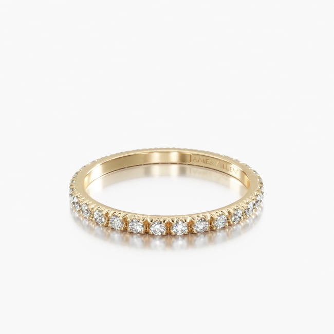 Based on one of our best-selling rings, we have made this French Cut pavé set eternity ring on a thinner band, giving you the most delicate look possible with pavé set diamonds. *Stone count and carat total weight will vary depending on ring size.