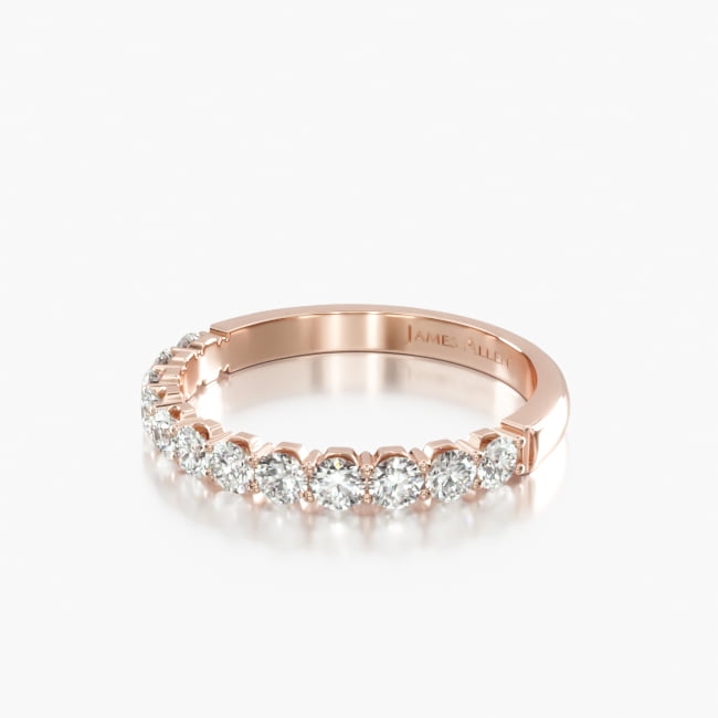 Glimmering diamonds perfectly sit in concave crescent settings to create a delicate and refined look.
