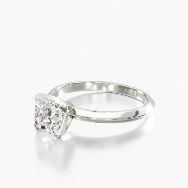 The knife edge design of this ring draws attention to the center diamond or gemstone you choose, showcasing its brilliance without detracting from its beauty. Center diamond or gemstone purchase required.