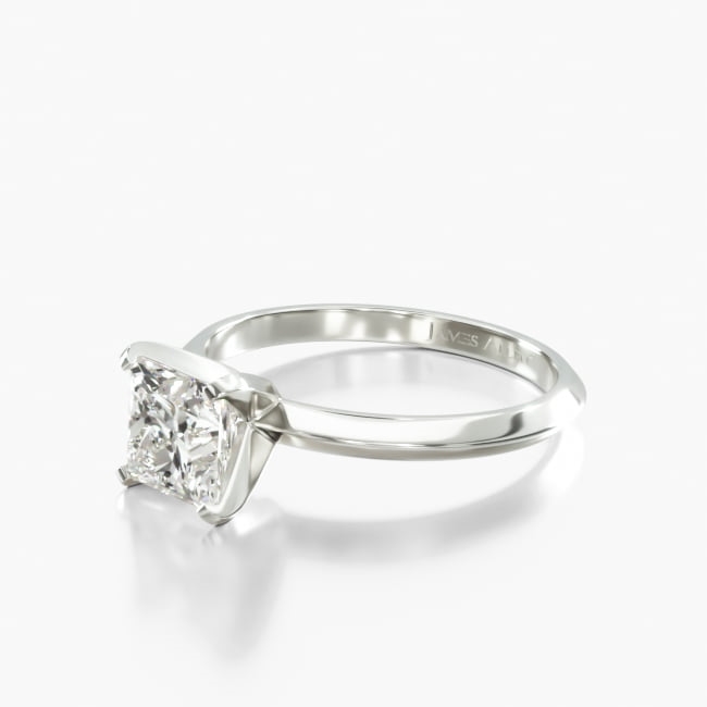 The knife edge design of this ring draws attention to the center diamond or gemstone you choose, showcasing its brilliance without detracting from its beauty. Center diamond or gemstone purchase required.