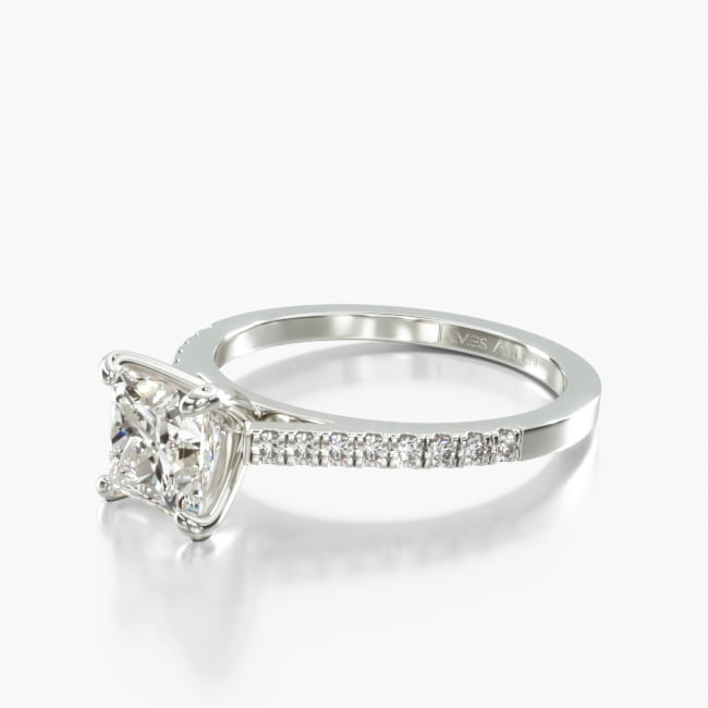 This pavé accented, classic cathedral engagement ring with a simple prong head assembly is the perfect way to express your love. 
This setting is able to hold all shapes, but please allow additional manufacturing time for fancy shapes.