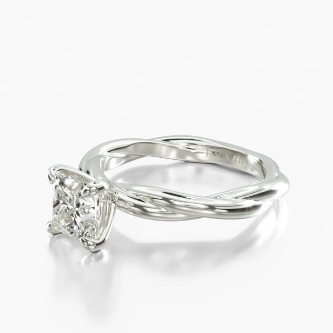 This contemporary rope style solitaire engagement ring features a woven design that is sure to garner attention, while the petite claw prongs accentuate the diamond or gemstone of your choice.