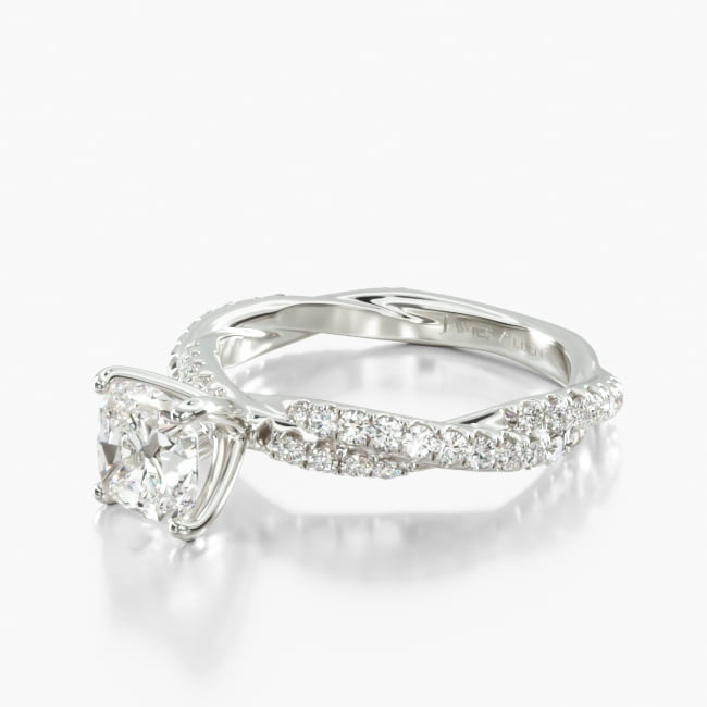 This contemporary rope style engagement ring features two woven Pavé diamond bands accenting the diamond or gemstone of your choice. Unique and beautiful, this setting perfectly showcases her sense of fashion with your love for her.