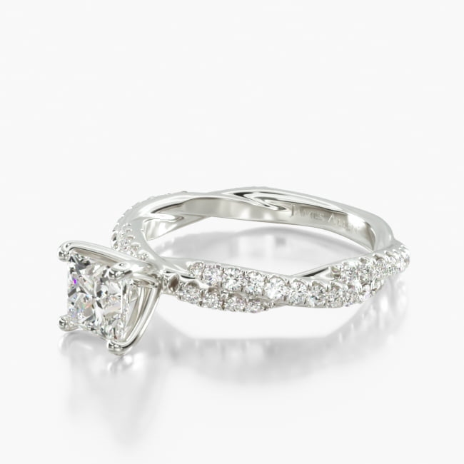 This contemporary rope style engagement ring features two woven Pavé diamond bands accenting the diamond or gemstone of your choice. Unique and beautiful, this setting perfectly showcases her sense of fashion with your love for her.