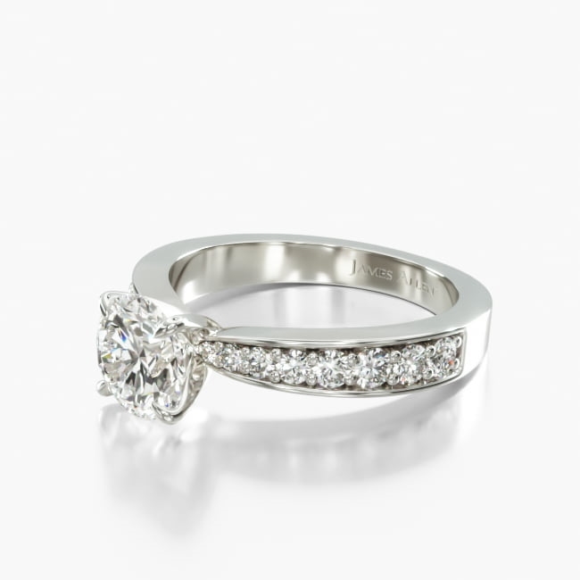 The center diamond or gemstone of your choice creates a magnificent display in a Pavé tapered band. It fits perfectly together with the matching wedding band to create a harmonious pairing.