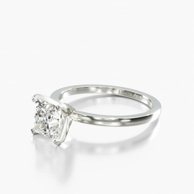 Classic and refined, this piece offers understated elegance and unsurpassed comfort while highlighting the center diamond or gemstone you select. Designed with smaller carat weight diamonds in mind, it is sophisticated and petite without sacrificing stability.