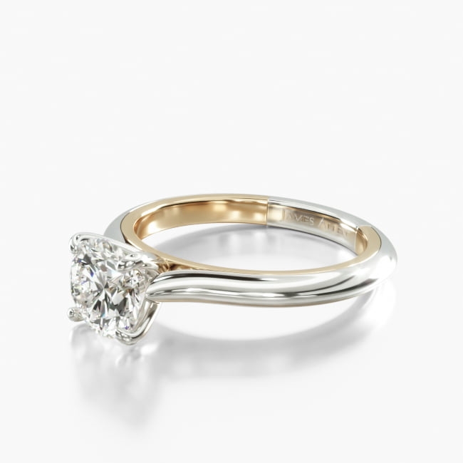 An excellent pick for those seeking a classic, simple look with the modern twist of a two tone band. Yellow gold lines the inside of the band to add a luxurious pop of color on this classic, standout style.