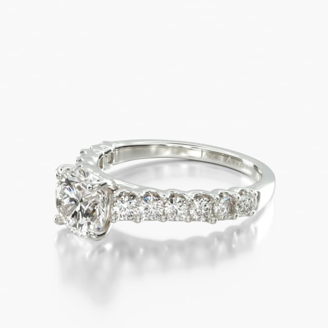 Feel the magic on your finger when you sport this ring featuring side stone diamonds leading up to the cathedral shank, which highlights your center stone. Pair it with the matching wedding ring for the ultimate shine.
