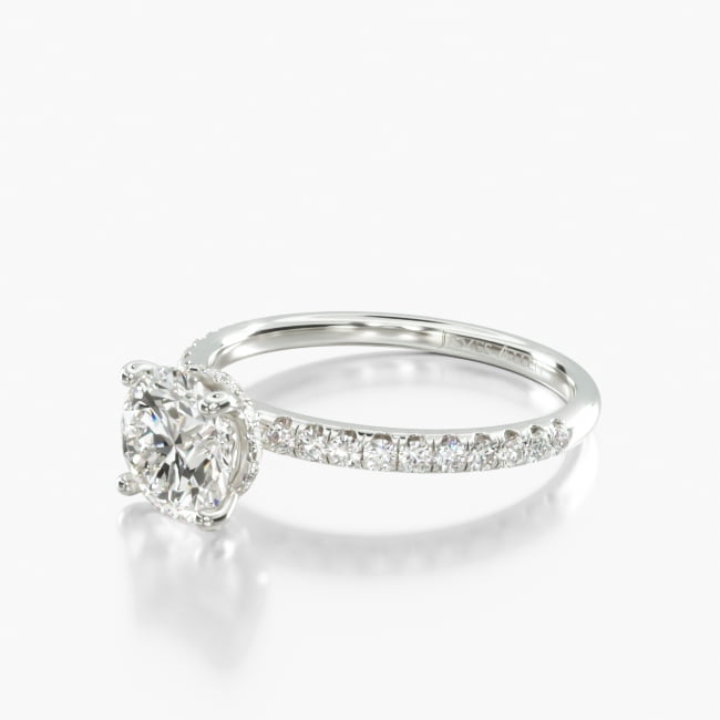 Diamonds everywhere you look, and some where you didn't! This is the perfect ring to sparkle as bright as their smile.