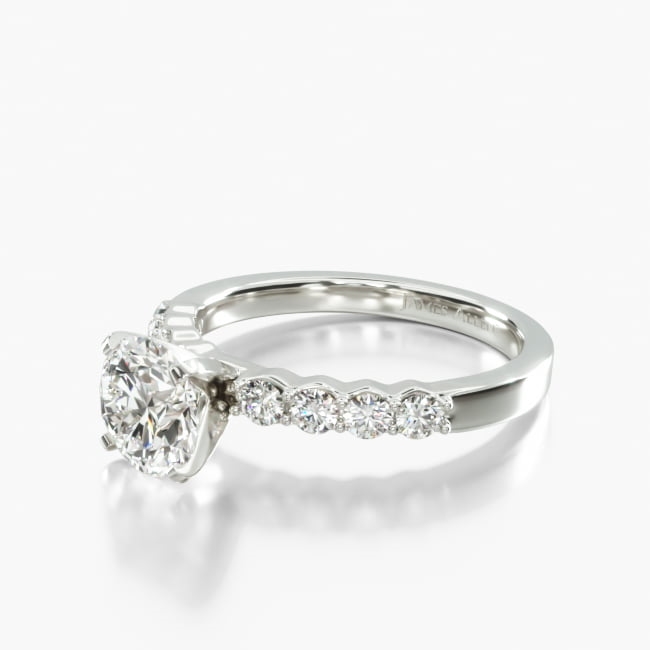 Featuring four dazzling diamonds on each side of the center stone, this ring is the ultimate in sparkle.