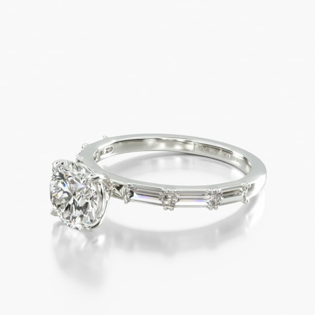 Simple yet beautiful this ring features a line of baguette diamonds gracefully set on a sleek metal band to perfectly compliment the center diamond of your choice