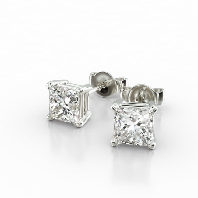 This pair of classic princess cut diamond earrings feature a tapered basket, showcasing the unique characteristics of the princess cut diamonds of your choice. Linear, chunky flashes of light shimmer though out this dramatic geometric pattern. Center diamonds or gemstones purchase required