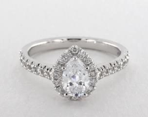 Jeff Cooper

Cry with Joy.  The Tate Pear Shape Engagement Ring and Tate(1.5) wedding band. In this fancy engagement style, round accent diamonds form a Tear drop shaped halo that surrounds your center pear shaped diamond. An innovative design that makes your center stone the sparkling center of attention. Available for 7X5 MM pear shaped center. Can be custom made to fit any shape center stone. Hand crafted in either Platinum, 18K Gold or 14K Gold. 