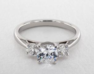 Martin Flyer

The timeless appeal of a three stone diamond engagement by Martin Flyer features two round brilliant diamonds (.32 ctw) to accent the center diamond of your choice. A Flyer Fit exclusive design that is crafted to allow the engagement ring and wedding band to fit perfectly flush with a variety of wedding bands.