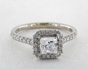 Martin Flyer 

This micro pavé diamond halo engagement ring features 36 round brilliant diamonds totaling .35 total carat weight. The classic quintessential diamond engagement ring for the center diamond of your choice.