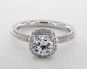 Martin Flyer

This micro pavé diamond halo engagement ring features 106 round brilliant diamonds totaling .67 total carat weight. The classic quintessential diamond engagement ring for the center diamond of your choice.