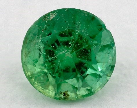 This 0.86 Round Green Emerald is sold exclusively by James Allen 