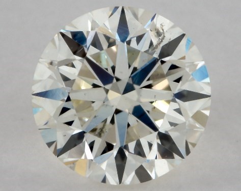 This 0.71 carat round diamond K color SI2 clarity has Very Good proportions and a diamond grading report from GIA