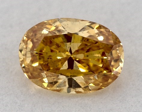  0.39 Carat Orange SI2  oval diamond