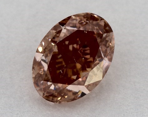  0.62 Carat Orange SI1  oval diamond