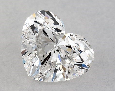 This 0.71 carat heart diamond E color SI1 clarity has Ideal proportions and a diamond grading report from GIA