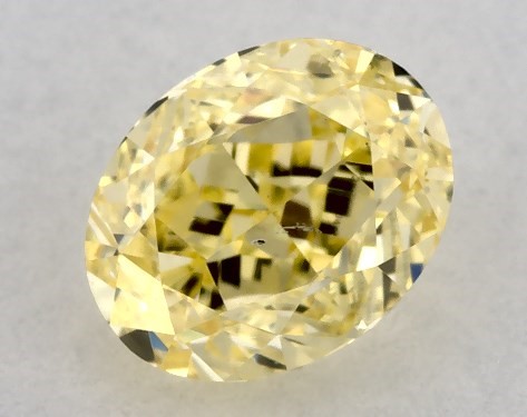  0.41 Carat Yellow SI1  oval diamond